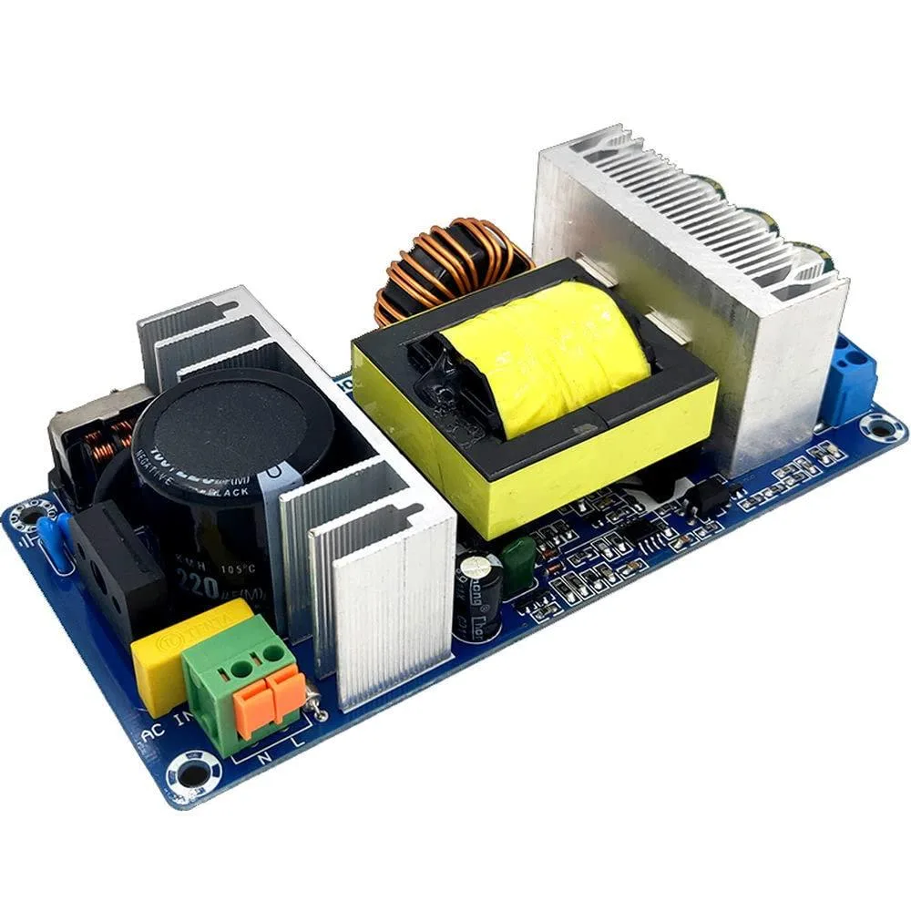 Green rectangular open-frame power supply board with soldered components and mounting holes