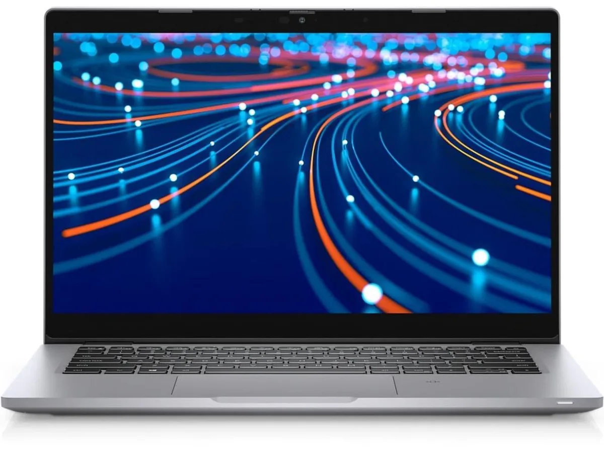 Silver Dell Latitude 5320 laptop, 13.3 inch screen, shows signs of use