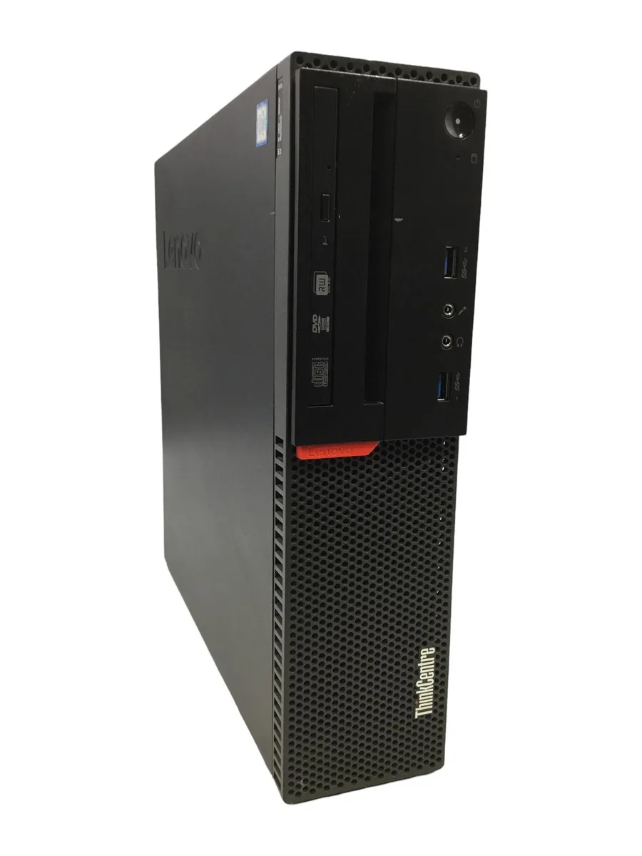 Small black desktop tower with keyboard and mouse