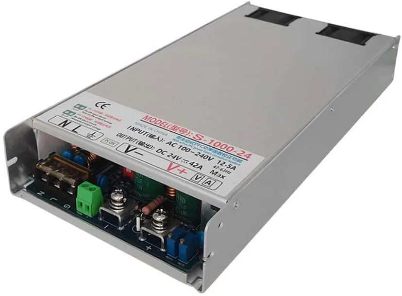 Rectangular metal power supply unit with fan cooling, silver finish, screw terminals visible