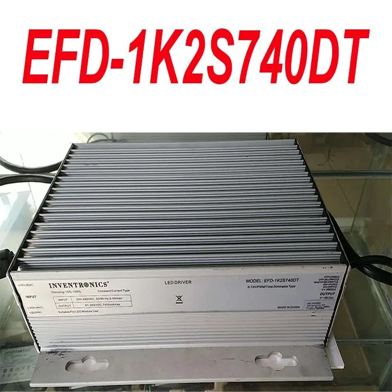Rectangular black ATX power supply unit with fan grille and power socket