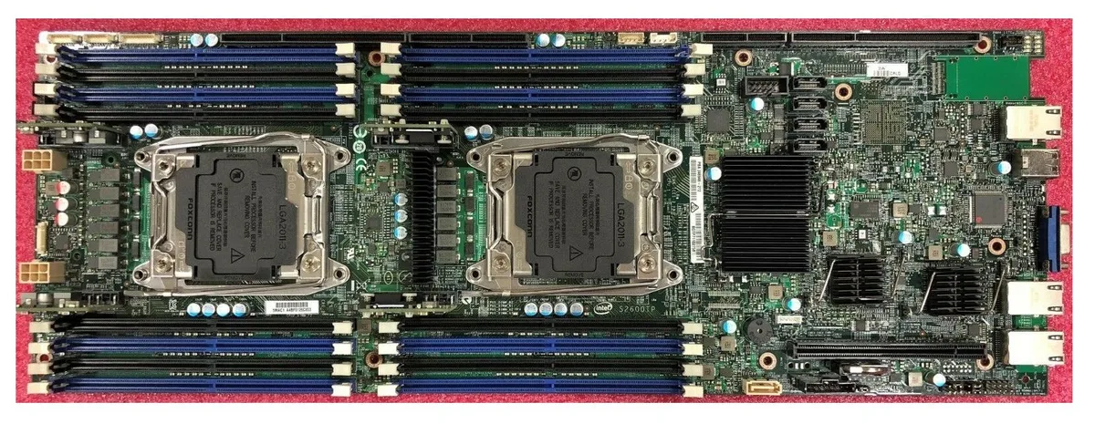 Green rectangular server motherboard with sixteen DIMM slots and multiple expansion sockets, 2U rack form factor