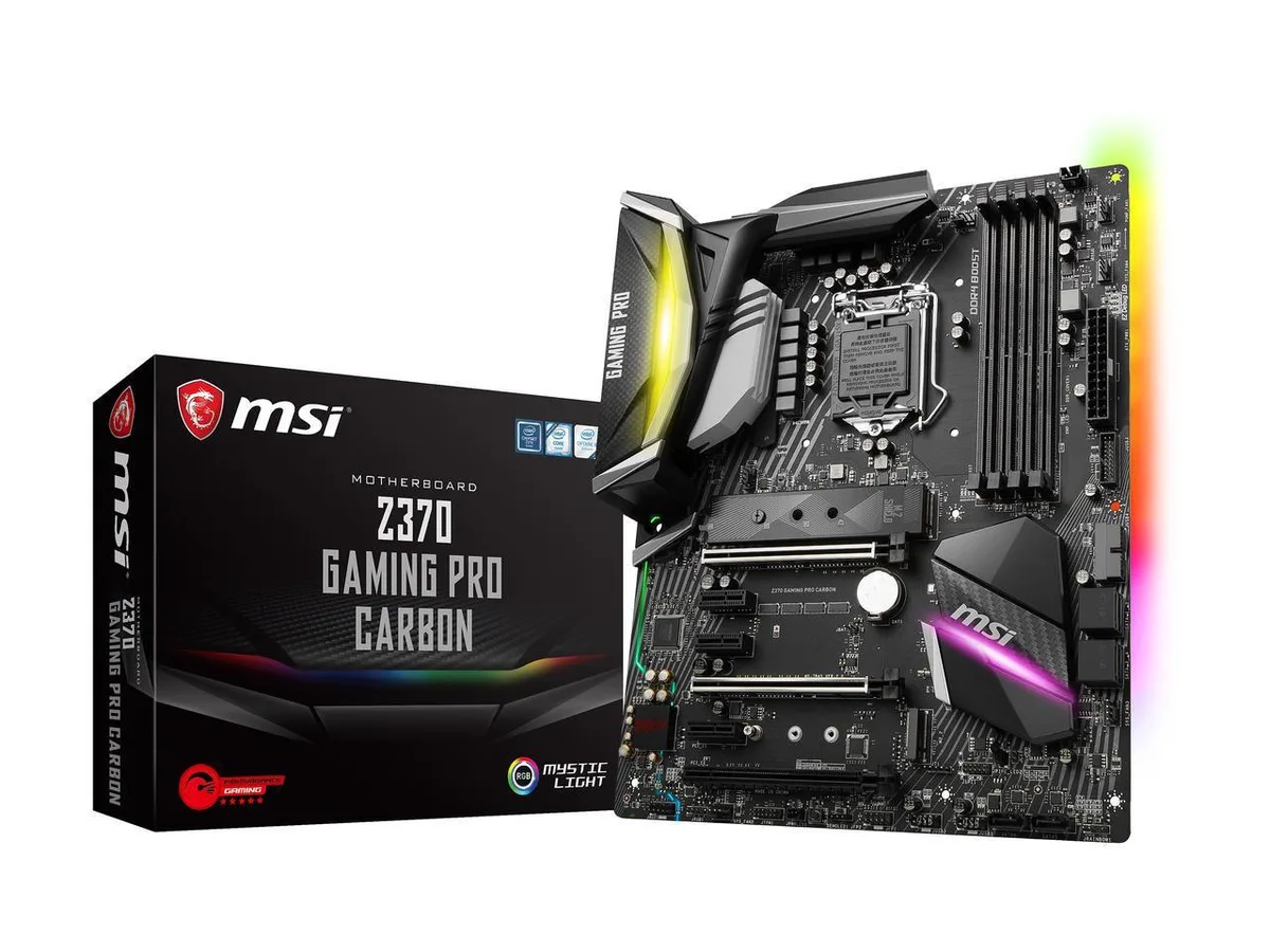 Black ATX motherboard with carbon-fibre pattern heatsinks and RGB lighting