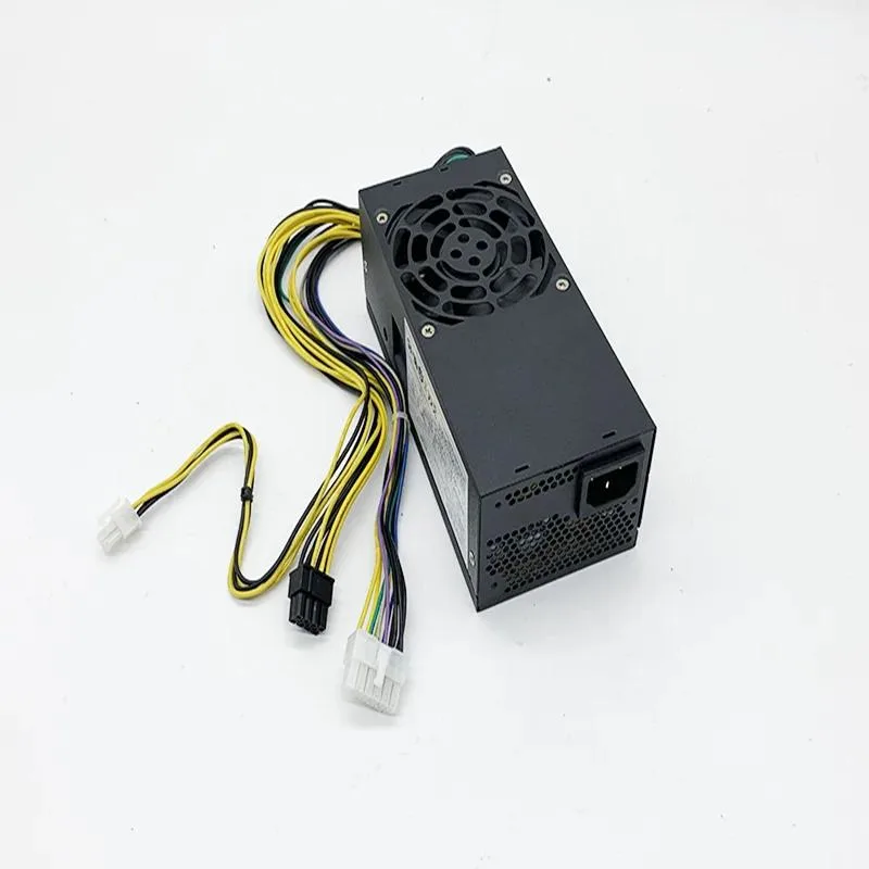 Rectangular silver metal power supply unit with ventilation grille and cable bundle