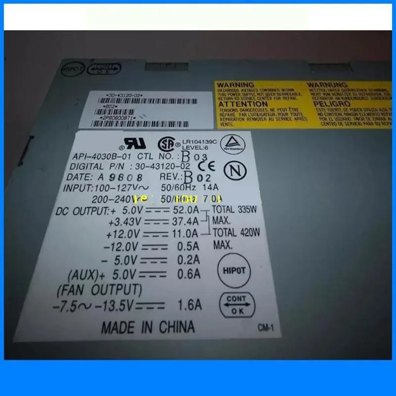 Rectangular ATX power supply unit with metal casing and ventilation grille