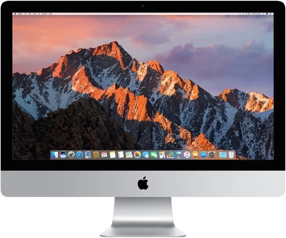 Silver aluminium all-in-one desktop with 27-inch Retina 5K display, thin tapered edges, third-party keyboard and mouse