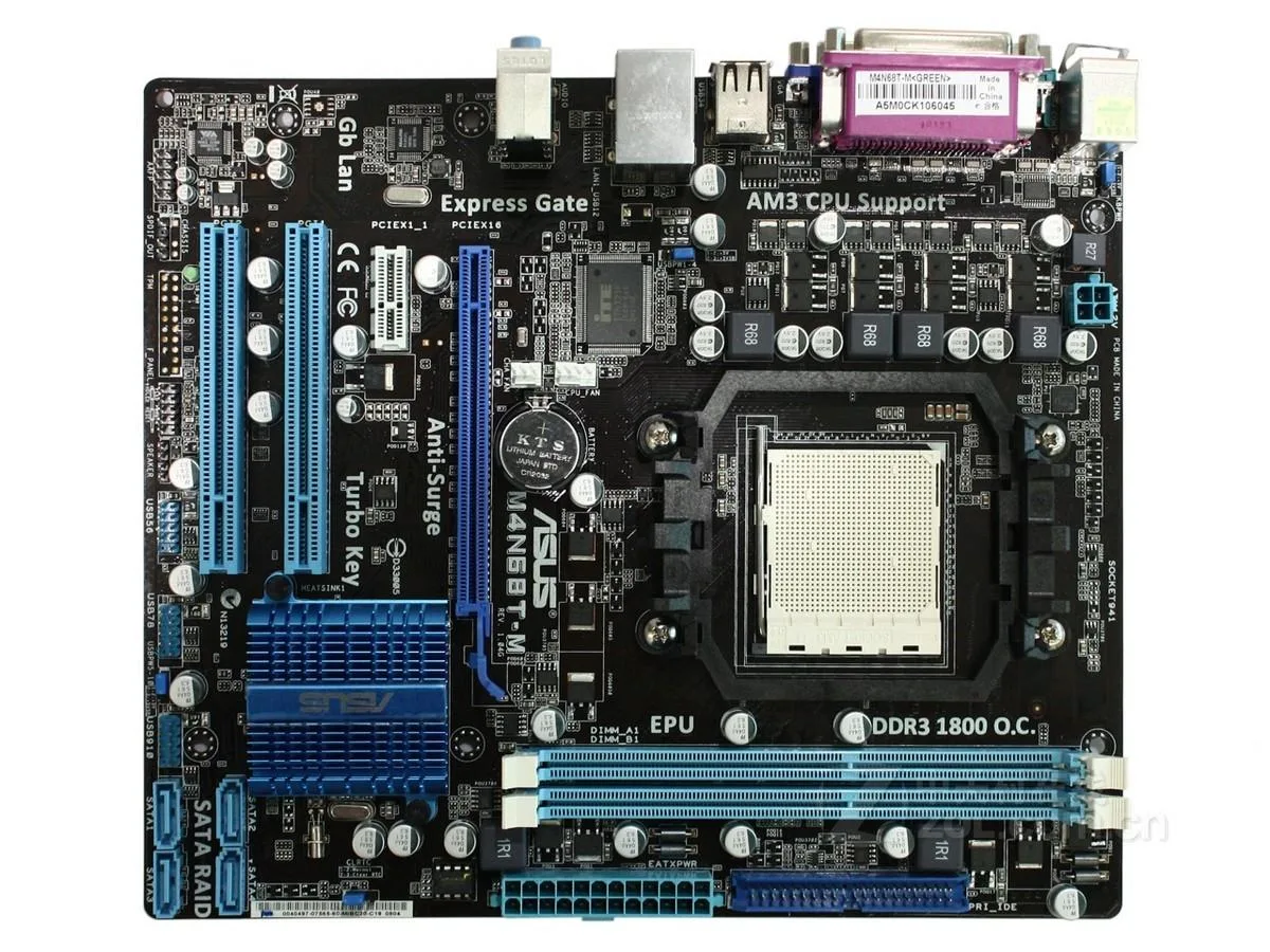 Green Micro ATX motherboard with silver CPU socket and DDR3 slots