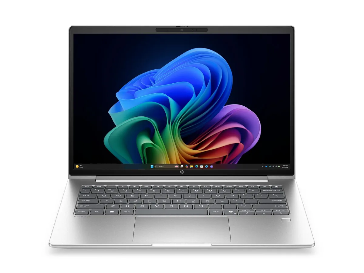 Silver 14-inch laptop, thin tapered profile, matte finish