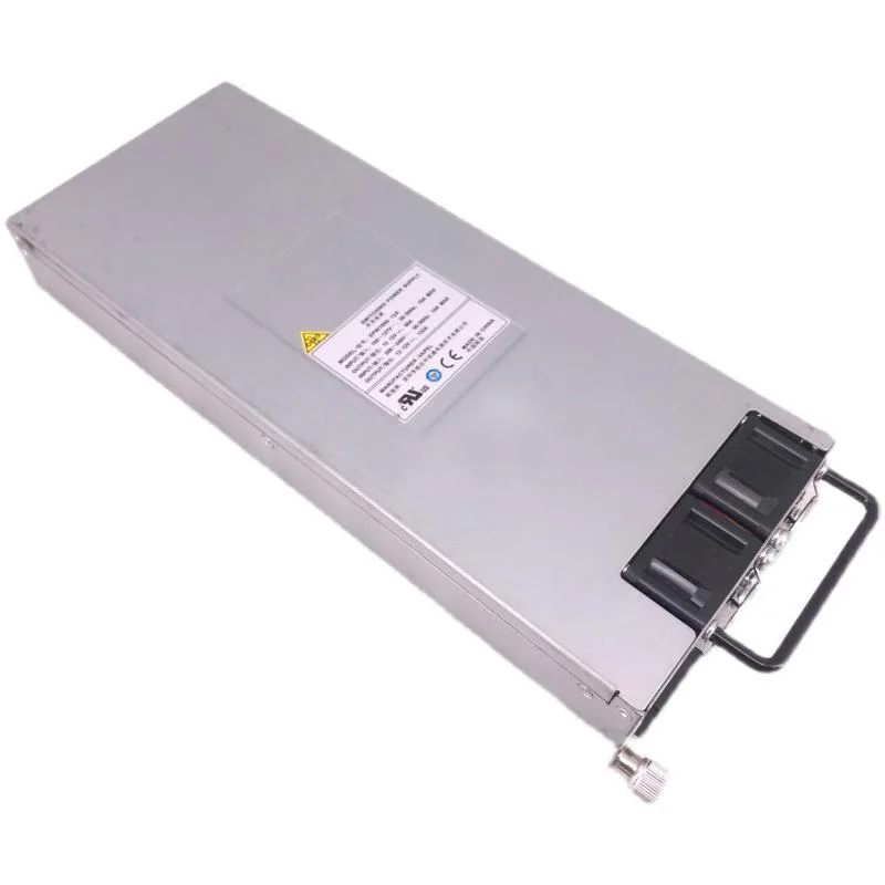 Rectangular silver server power supply unit with rear fan grille and power connector
