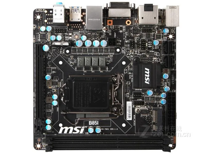 Green Mini-ITX board with black sockets and silver heatsinks