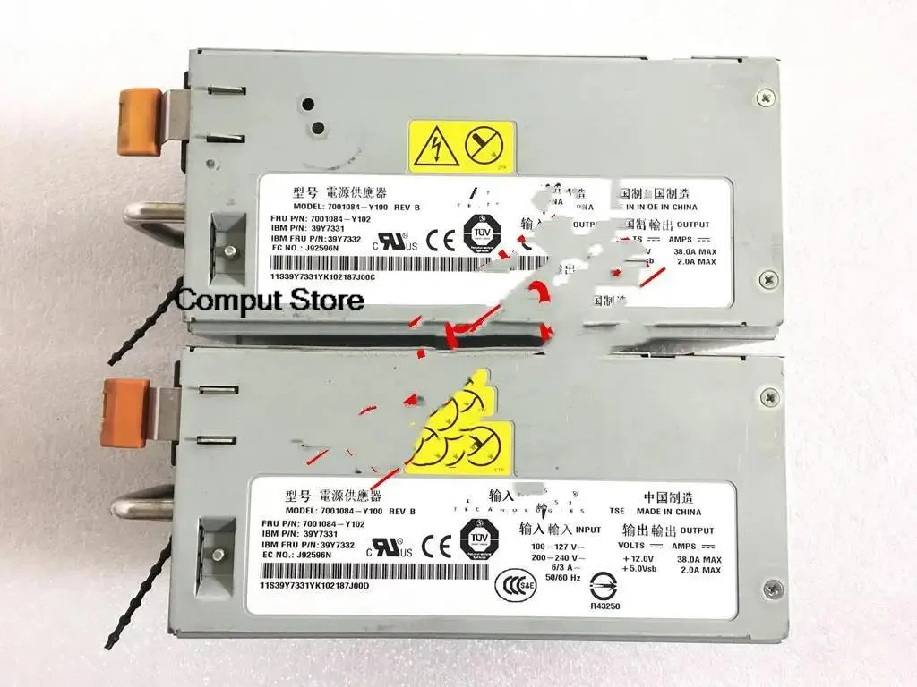 Silver rectangular server power supply unit with front grille and label