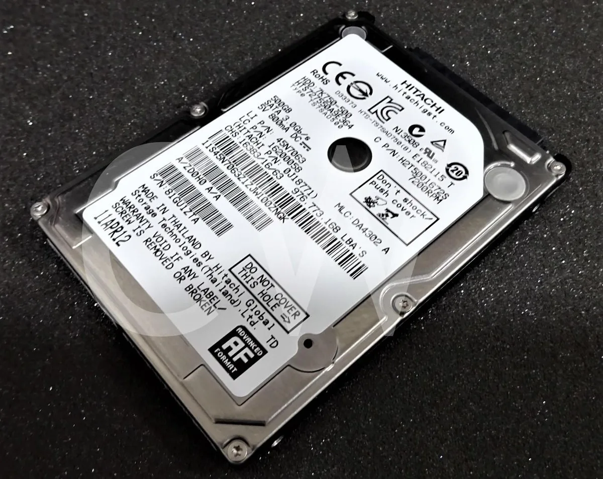 Silver rectangular 2.5 inch SATA hard drive with label showing model HTS727550A9E364