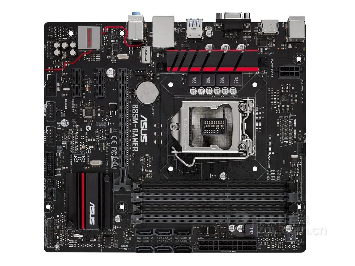 Micro ATX motherboard in black with grey slots and silver heatsinks
