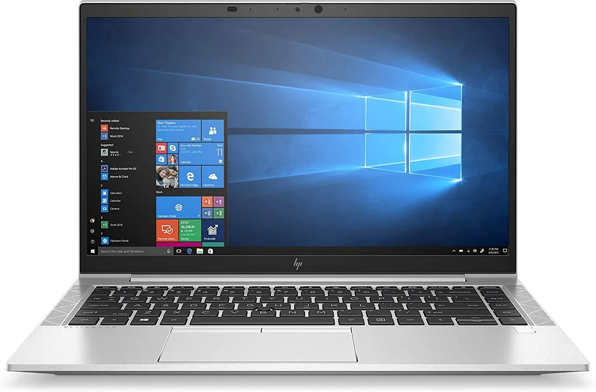 Silver 14-inch HP ProBook 440 G8 laptop with minor scratches and dents