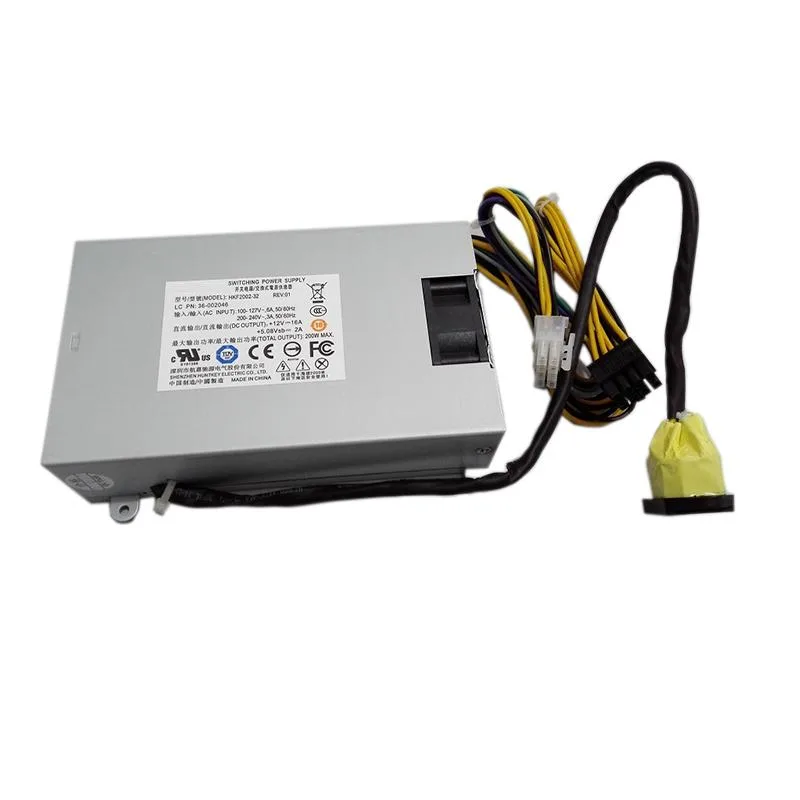 Compact silver ATX power supply unit with fan grille and cable bundle