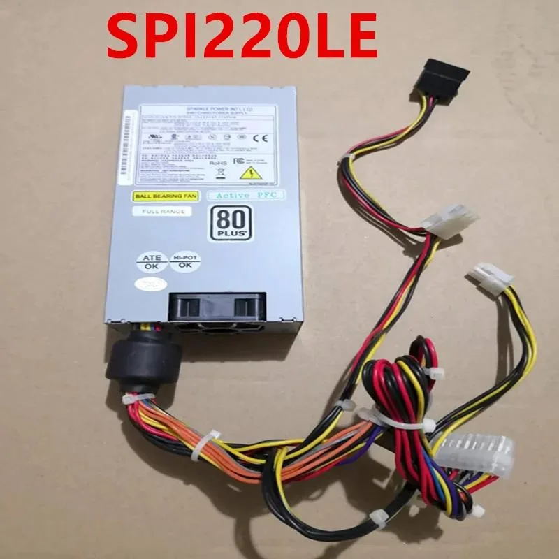 Compact 220W ATX power supply unit with gold finish and cooling fan