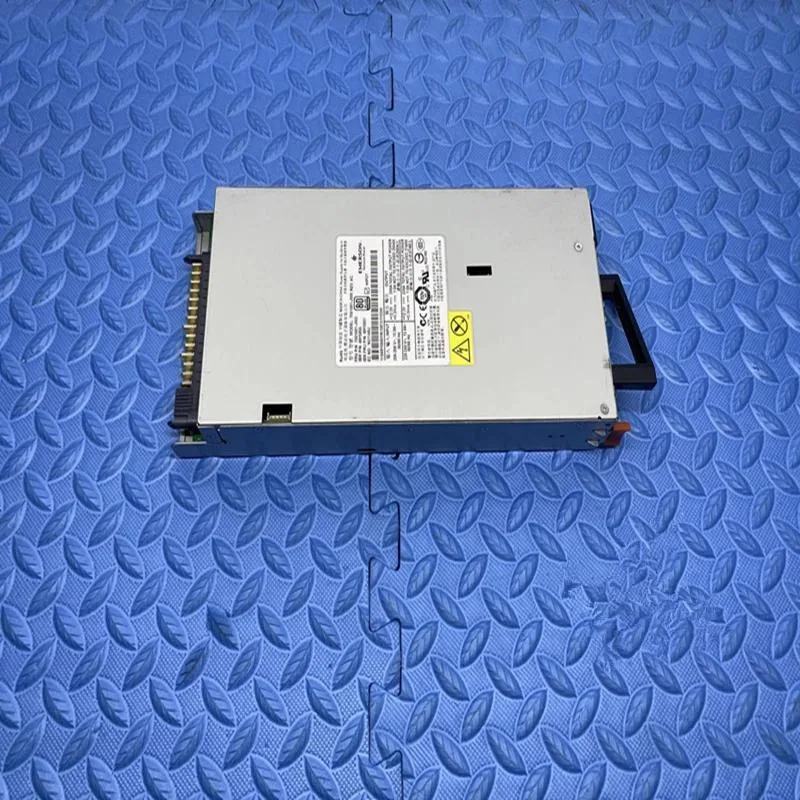 Silver metal ATX power supply unit with rear fan grille and power socket
