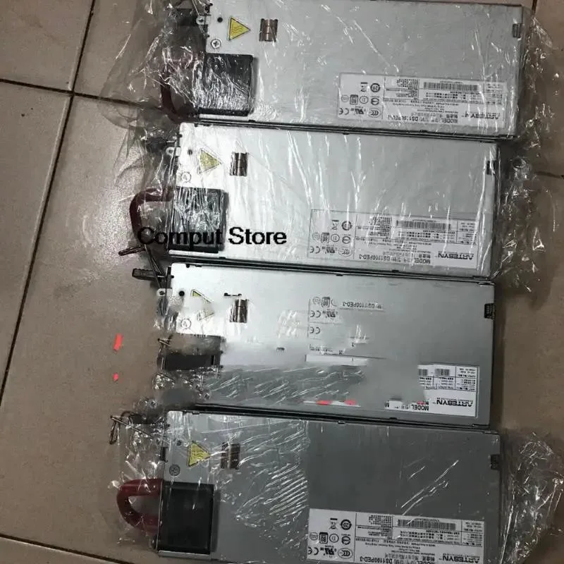 Silver rectangular ATX power supply unit with ventilation grille
