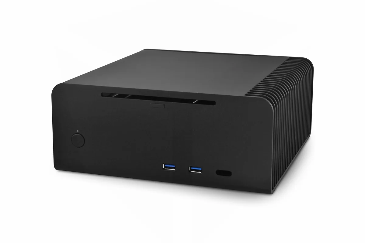 Compact silver aluminium Mini-ITX fanless chassis with side vents and front USB 3.0 ports
