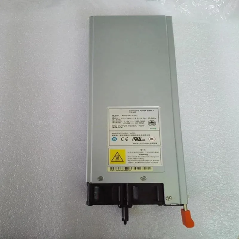Rectangular ATX power supply unit, matte black metal casing, 700W label visible