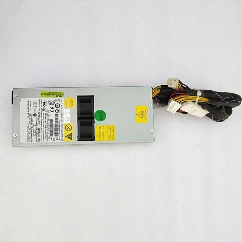 Black rectangular ATX power supply unit with gold certification badge and cooling fan visible
