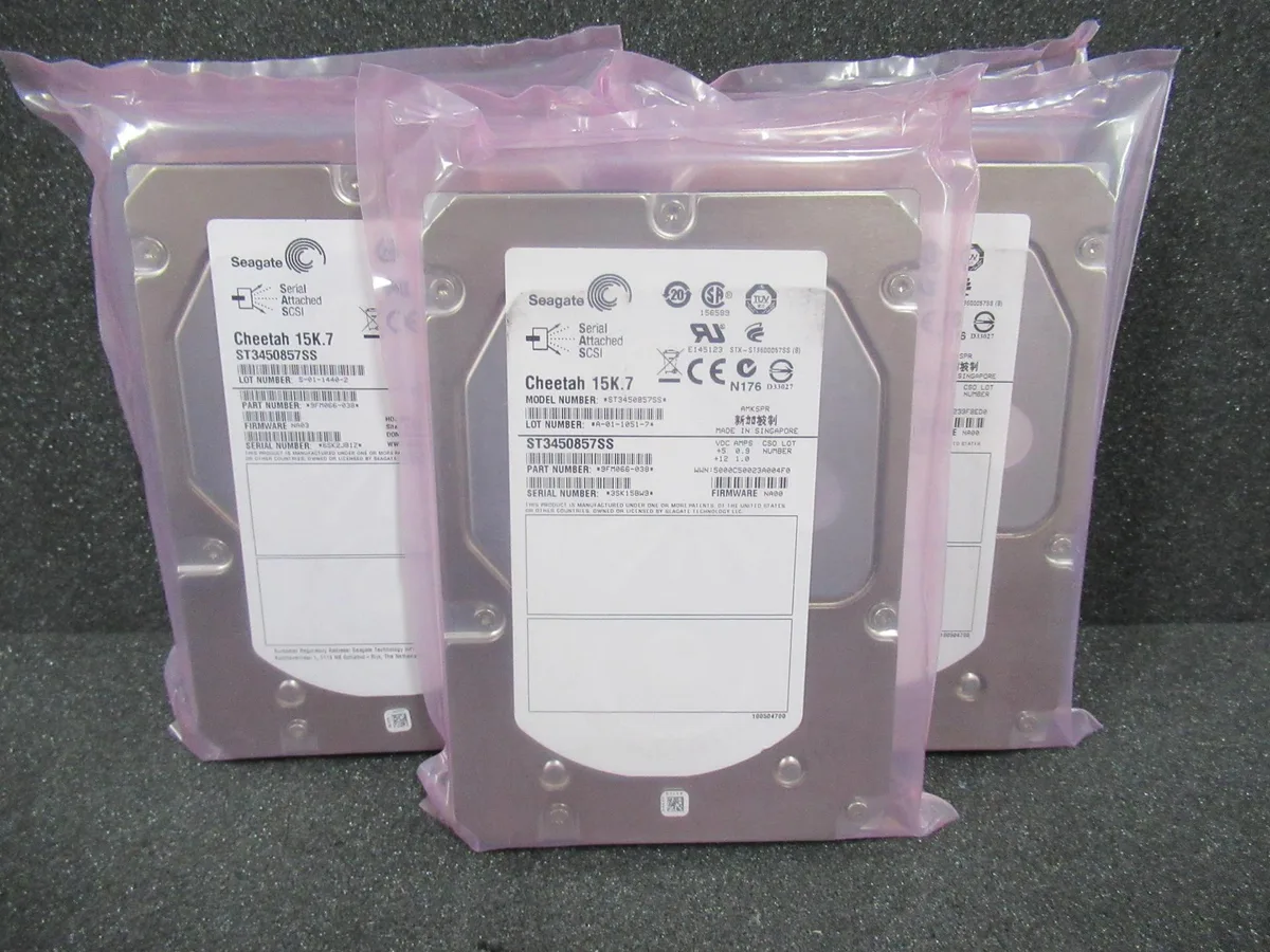 Silver 3.5 inch SAS hard drive with green circuit board visible on underside