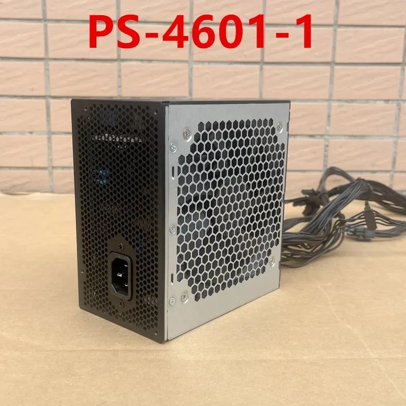 Rectangular ATX power supply unit in matte black finish with a large cooling fan grille on one side