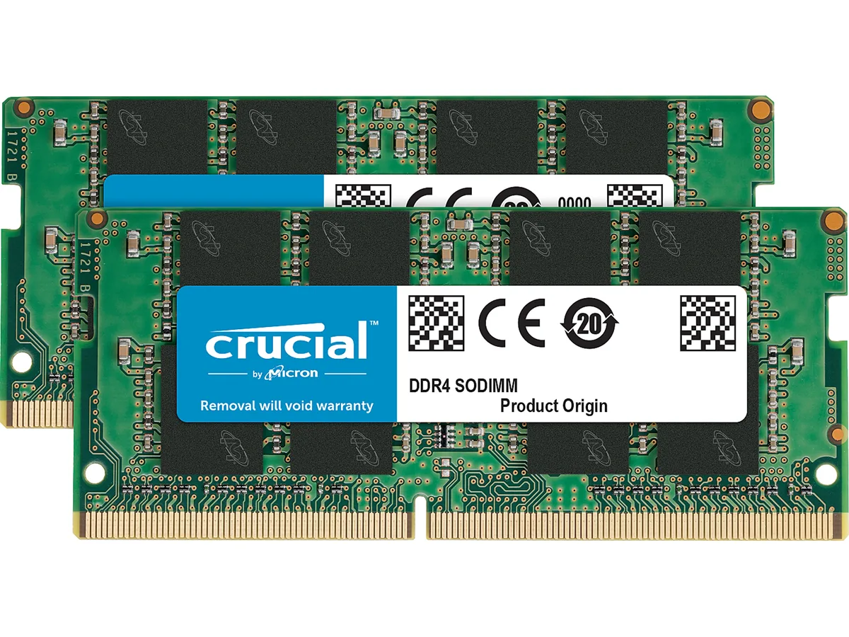 Two green DDR4 SO-DIMM sticks with black heat spreaders