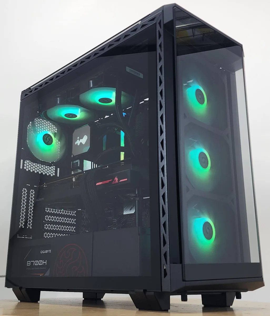 White mid-tower gaming PC with RGB AIO cooler visible through glass side panel