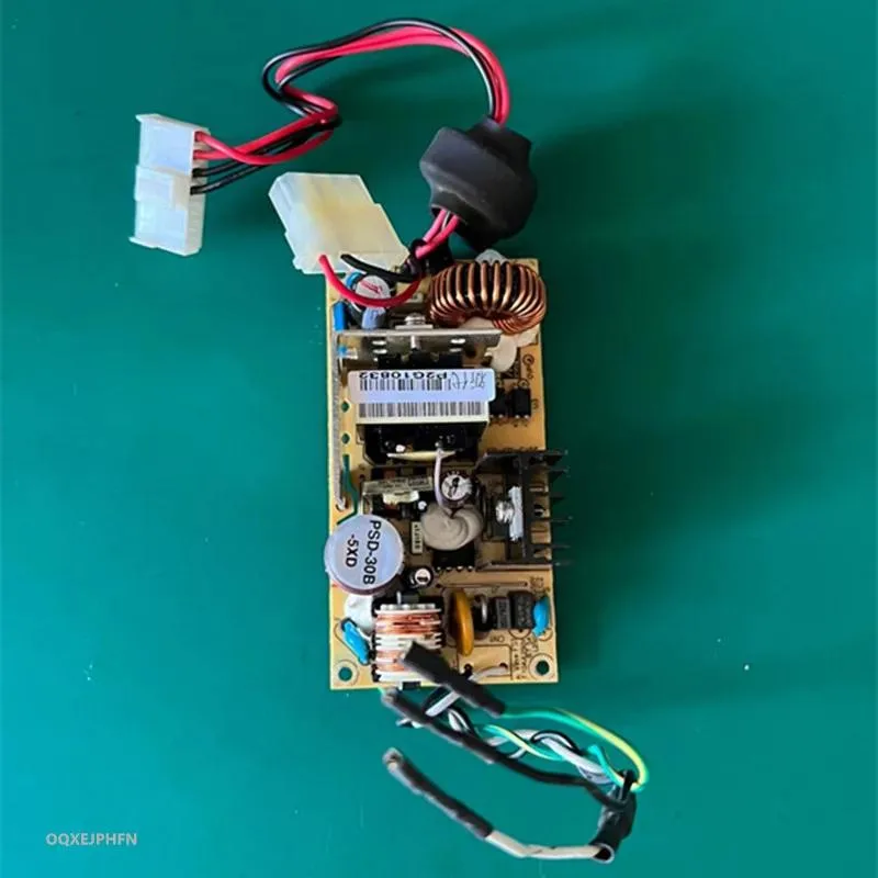 Small black ATX power supply unit with gold certification label