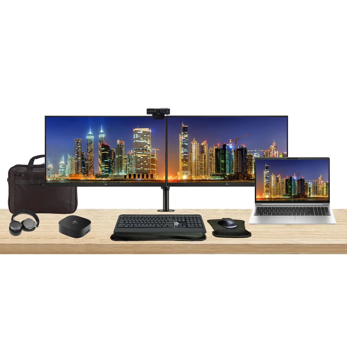 HP ProBook 450 G10 laptop with dual 24-inch monitors on stand, dock, keyboard, mouse, webcam, headphones, bag