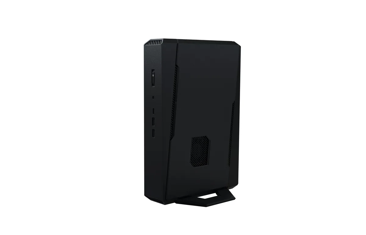 Black compact mini PC barebone with three visible cooling fans and toolless chassis design