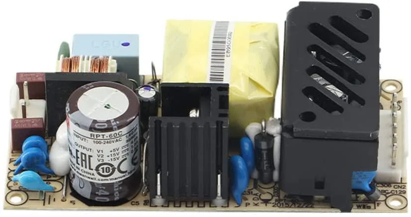 Green open-frame PCB power supply, four by two inches, triple output, medical grade