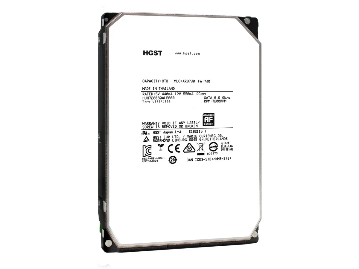 Silver 3.5 inch bare drive with SATA connectors and label showing HGST Ultrastar He8 8TB