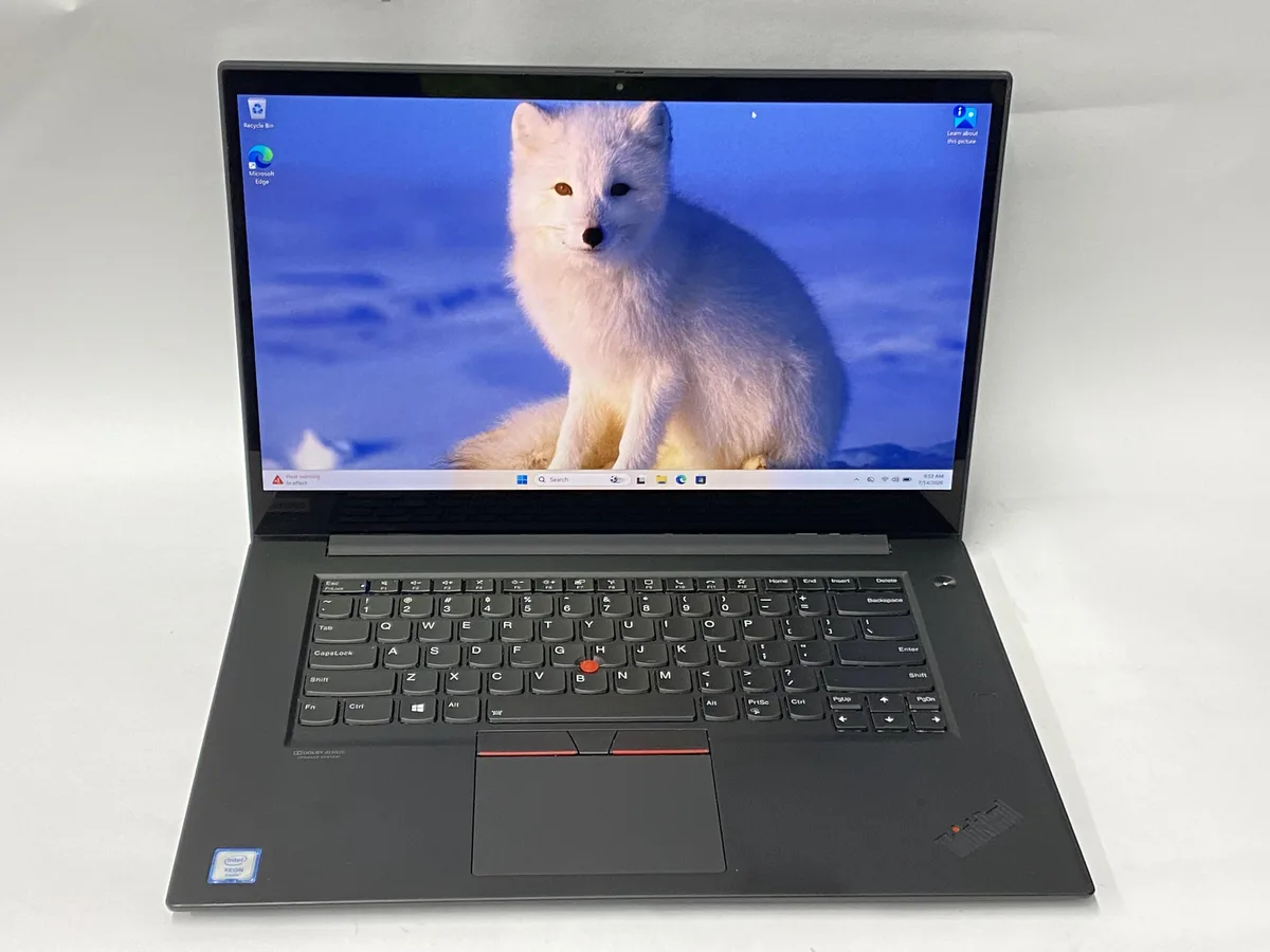 Silver Lenovo P1 Gen 3 laptop open showing 15.6 inch touchscreen and keyboard