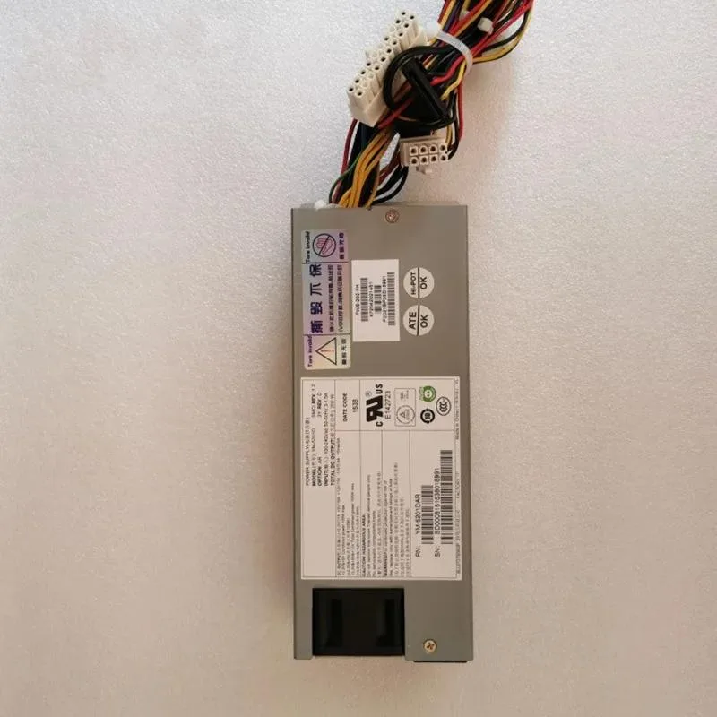 Compact ATX power supply unit with matte metal casing and rear fan grille
