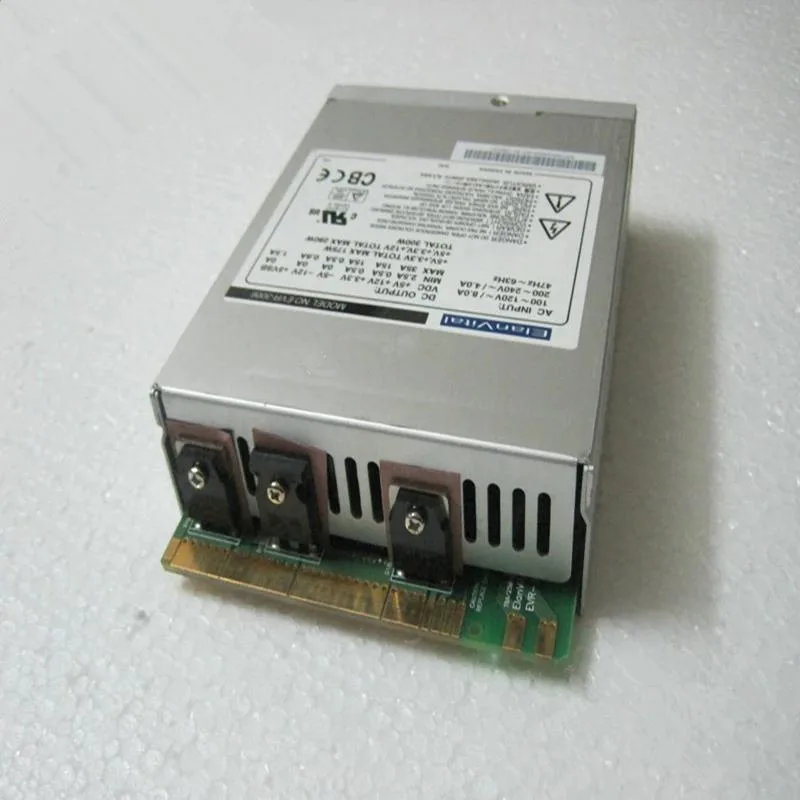Rectangular silver ATX power supply unit with fan grille and cable bundle