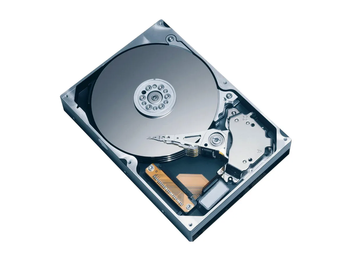 Silver 3.5 inch bare SATA hard drive with exposed circuit board