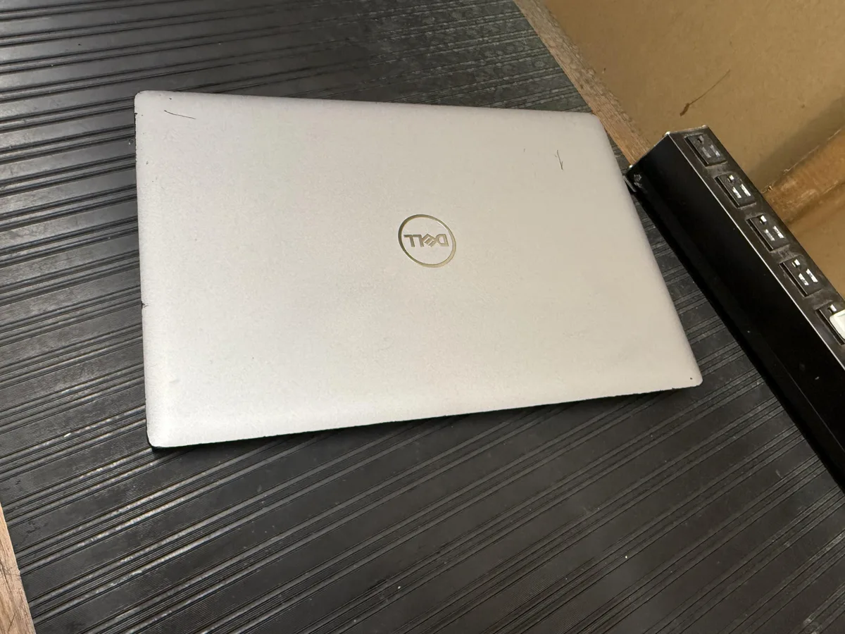 Silver 15.6 inch touchscreen laptop, worn keys and case scratches, Grade B condition