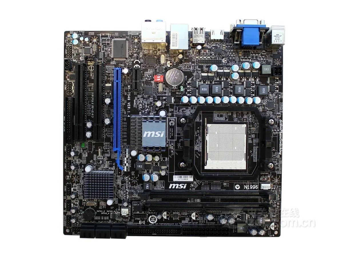 Green micro-ATX motherboard with black sockets and silver heatsinks
