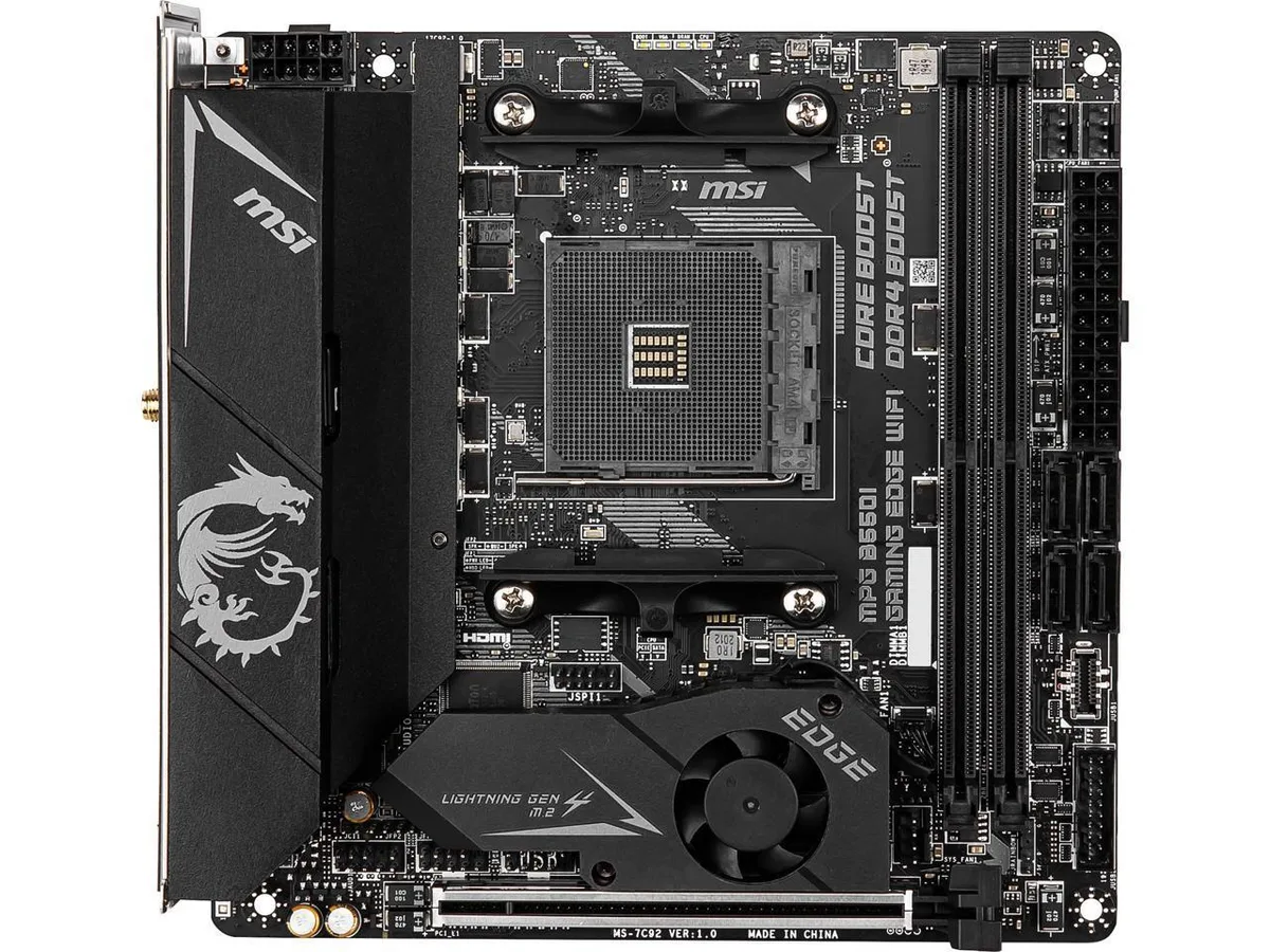 Compact Mini ITX motherboard in black with silver heatsinks and rear I/O shield