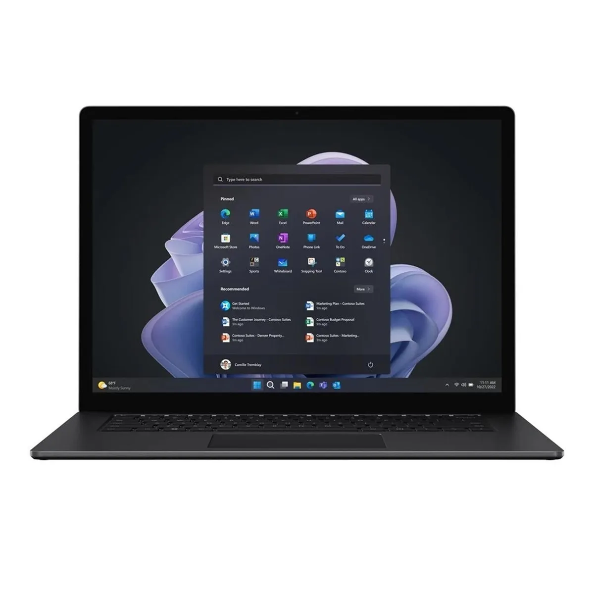 Matte black 13.5 inch touchscreen laptop closed on a plain surface