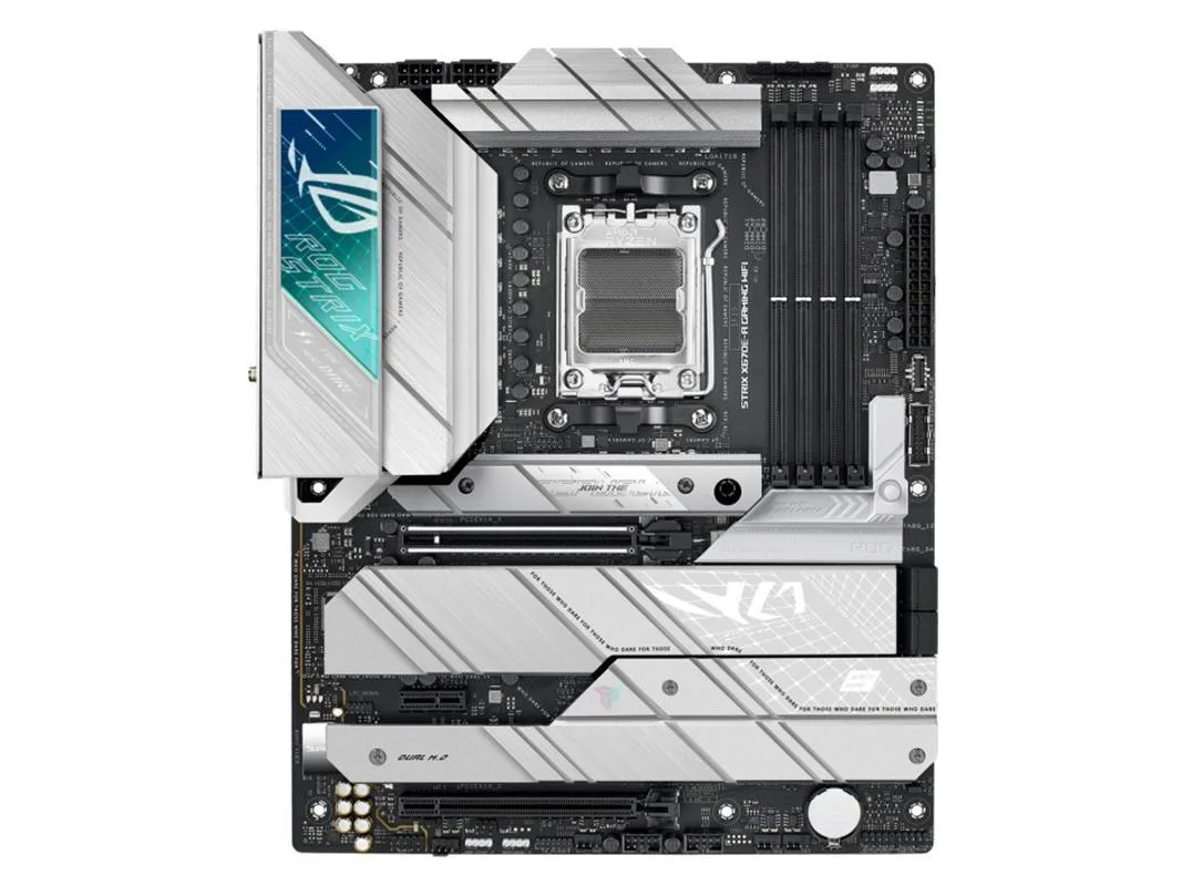 ATX motherboard in dark finish with silver heatsinks and integrated I/O shield