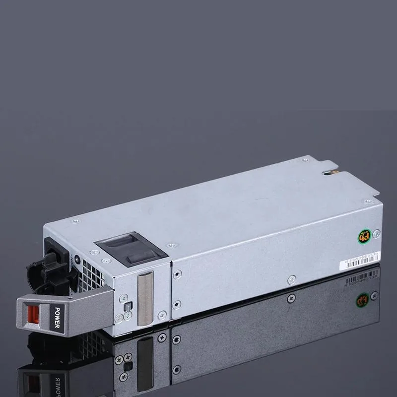 Rectangular ATX power supply unit with matte black metal casing and rear cooling fan grille