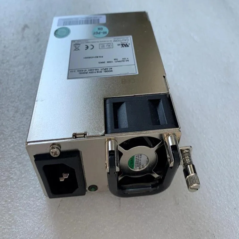 Rectangular silver ATX power supply unit with ventilation grille
