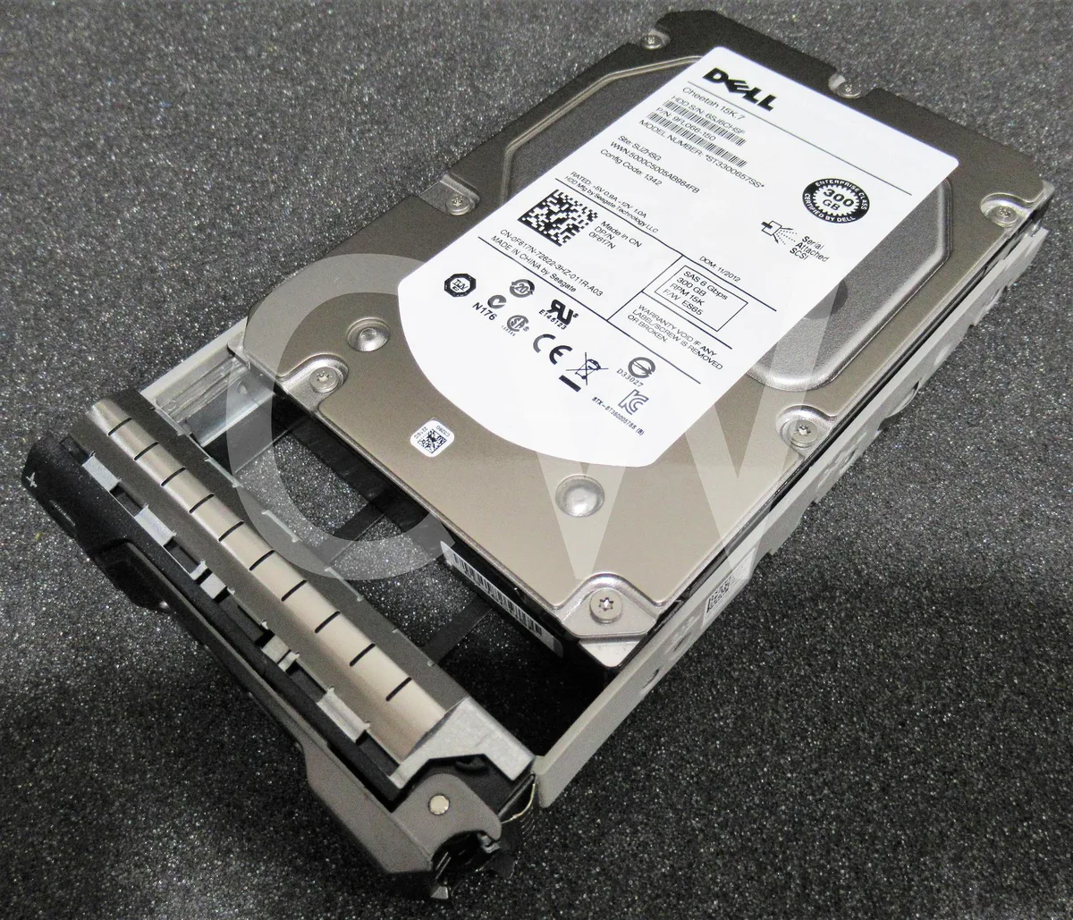 Silver 3.5 inch SAS hard drive with black Dell caddy tray attached