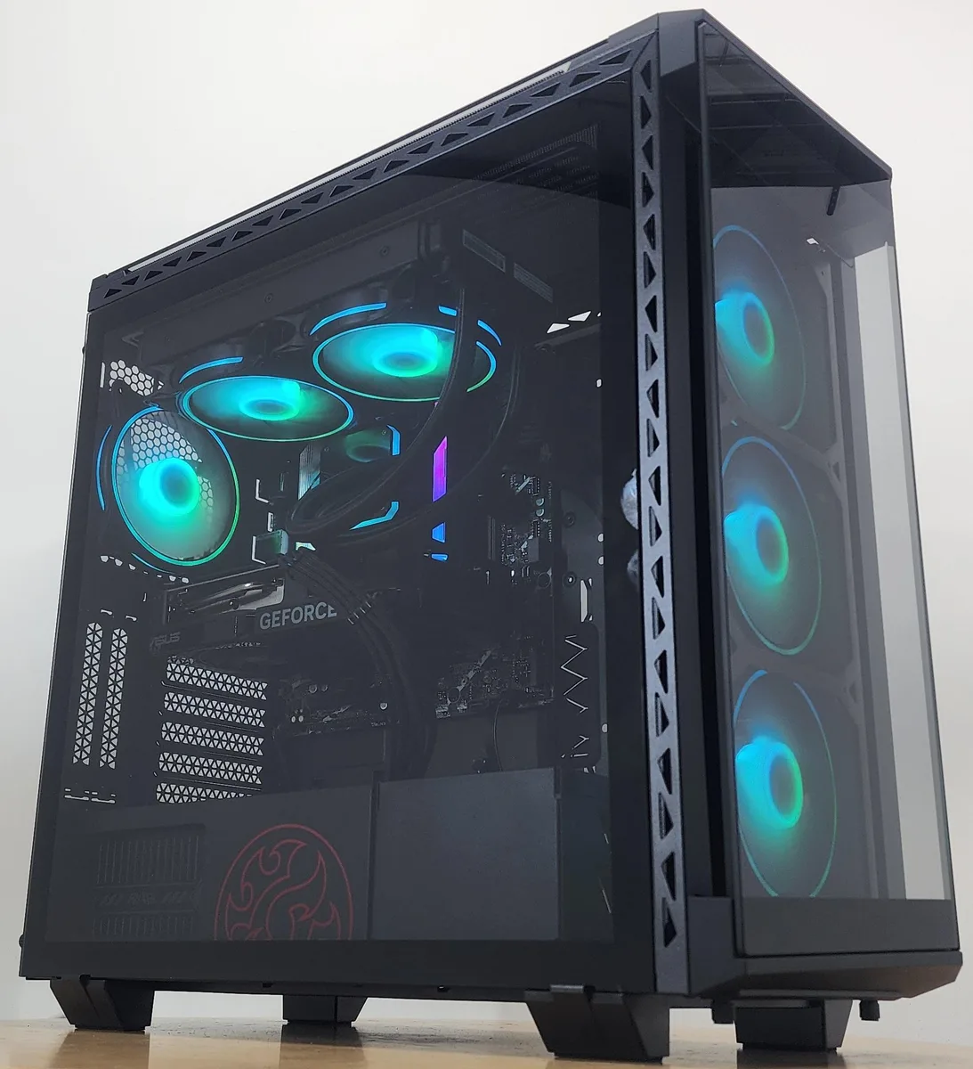 White mid-tower gaming PC with RGB liquid cooler and side window