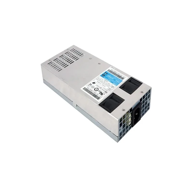 Silver rectangular 1U ATX power supply unit with ventilation grille and fan visible