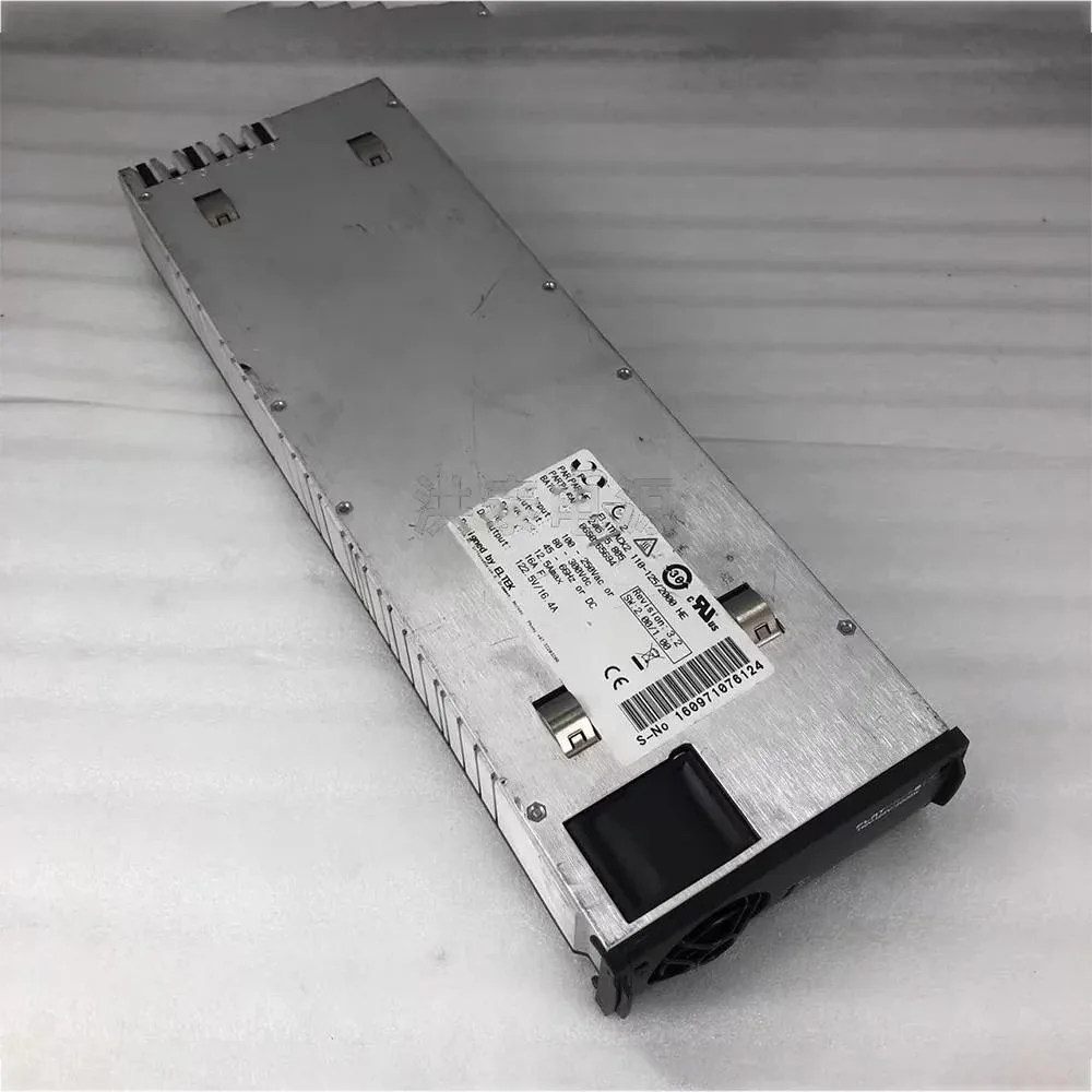 Rectangular metal power supply module with ventilation slots and front connector panel