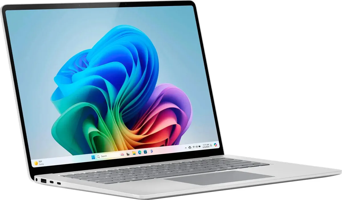 Platinum 15-inch laptop with touchscreen display, silver metal finish